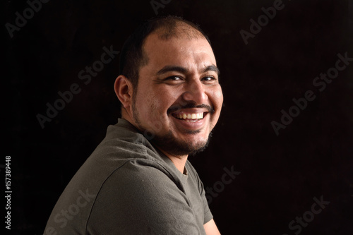 Fotografia Portrait of a latin man on black background