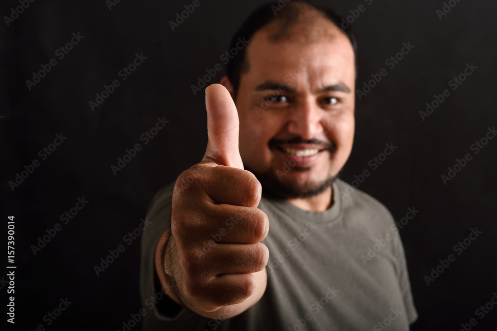 man doing the sign thumbs up on white background man doing the sign thumbs up on white background