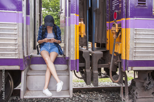 beautiful young asian girl traveling alone