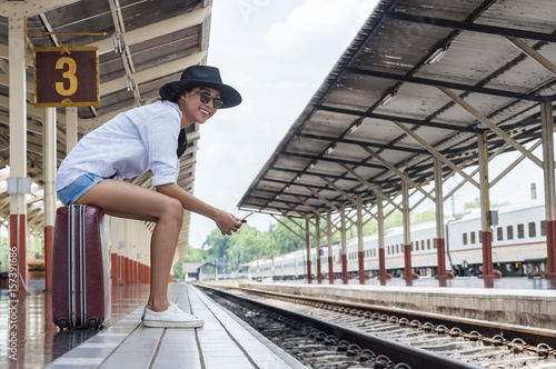 beautiful young asian girl traveling alone