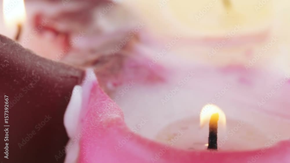 Burning wax candles StockVideo Adobe Stock
