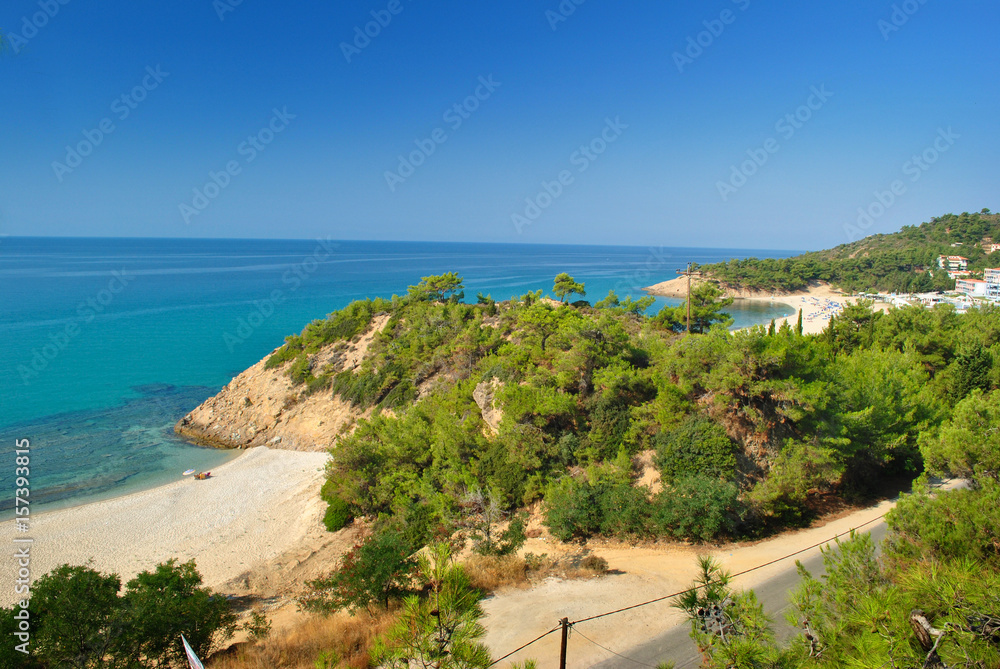 Sand beach with blue sea and blue sky on Thassos island Greece