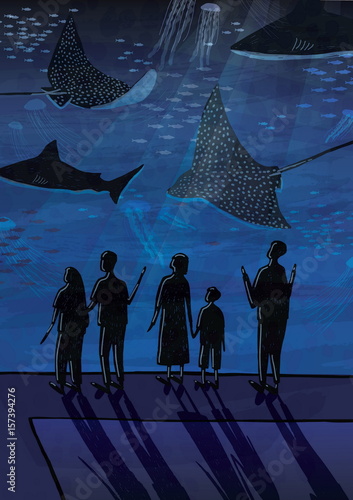 People in oceanarium. Couples, people with children watching fish.