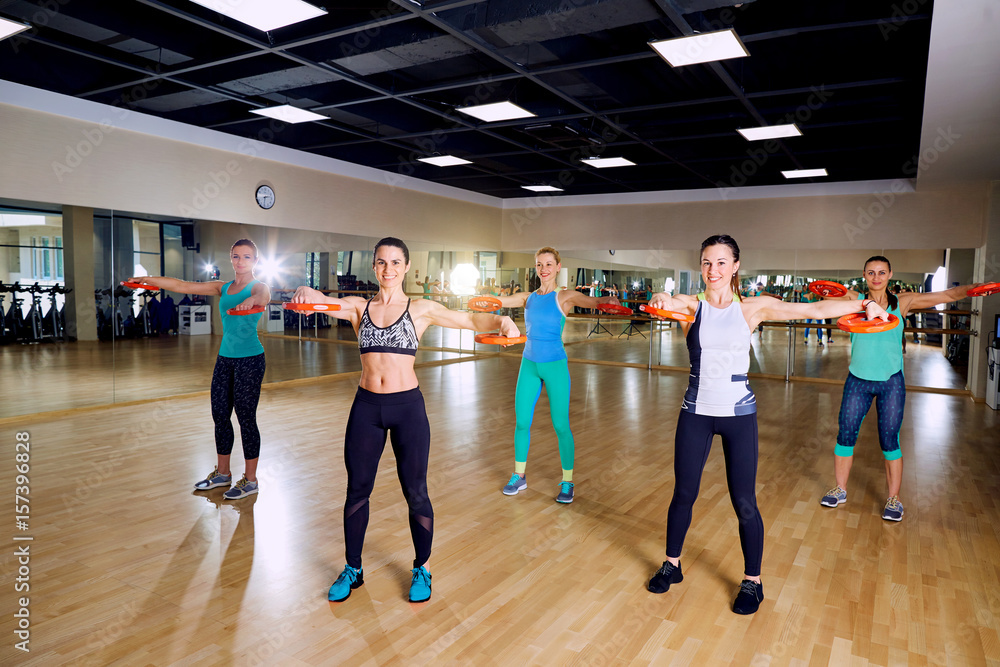 Group training of women in the gym.