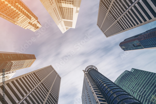 Business buildings skyline looking up with blue sky