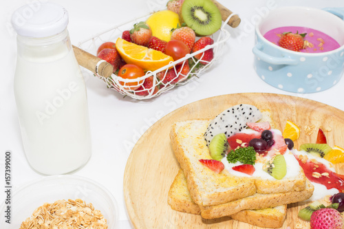 Toast and fruit total milk yogurt isolated on white background