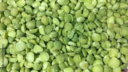 Great background of Dried Green Pea beans are rotating close up. Footage will work great for any videos dealing with cooking, health nutrition, restaurants and much more.