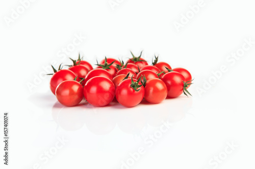 Fresh tomatoes isolated on white background
