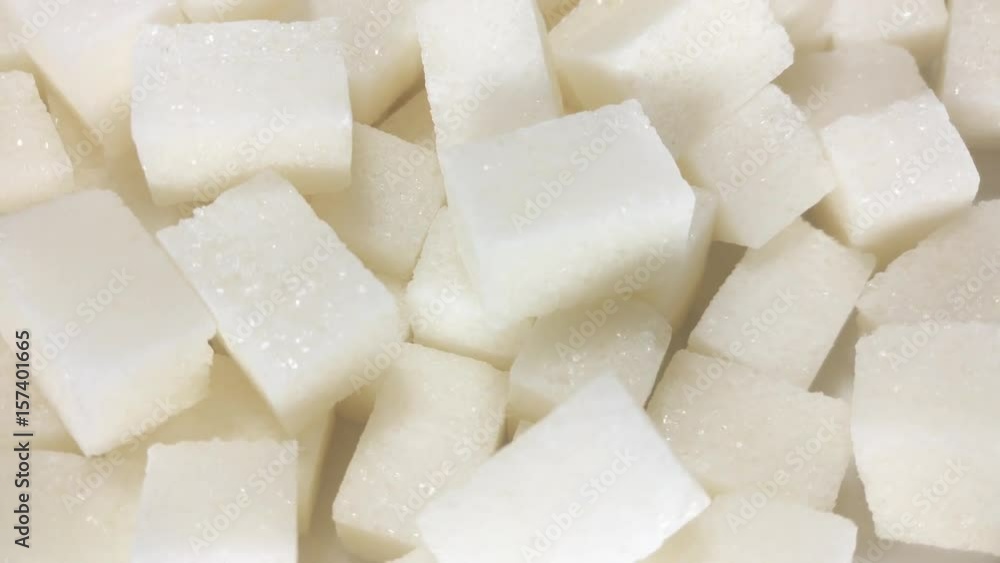 Great background of White Sugar cubes rotating close up. Footage will work great for any videos dealing with cooking, medicine, healthy nutrition and much more. Great background of White Sugar cubes rotating close up. Footage will work great for any videos dealing with cooking, medicine, healthy nutrition and much more.