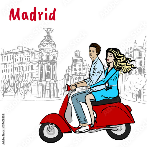 Man and woman driving scooter