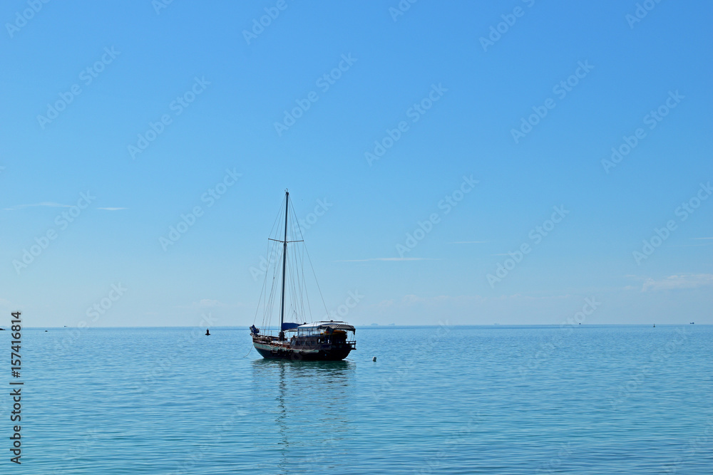 Floating fishing boat in the sea Floating fishing boat in the sea
