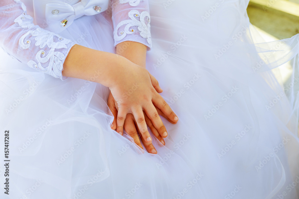 Child hands white dress Child hands white dress