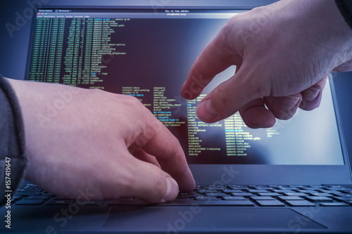 Photography Hacker working on a linux console commands