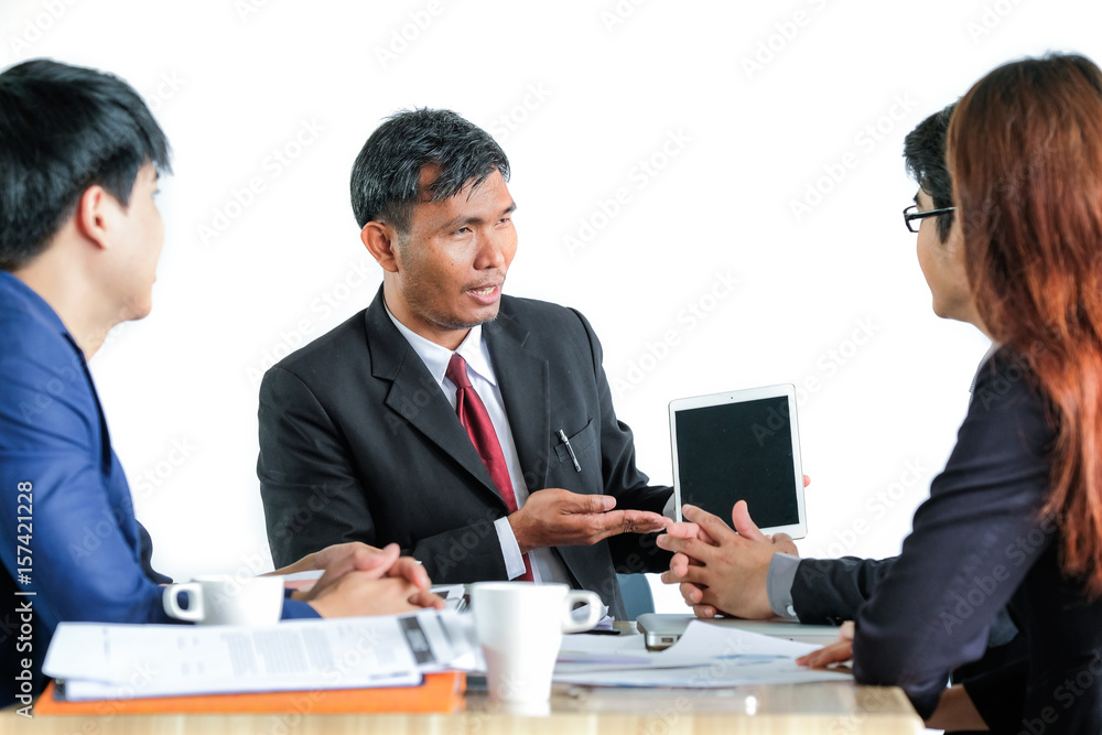 Portrait Of Multiracial Businesspeople Brainstorming In Meeting Portrait Of Multiracial Businesspeople Brainstorming In Meeting