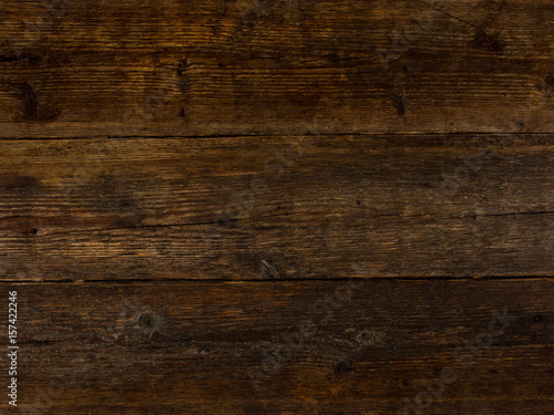 Wood texture. Dark wood texture. Wood-based panel. Wooden boards background. Top view, close up.