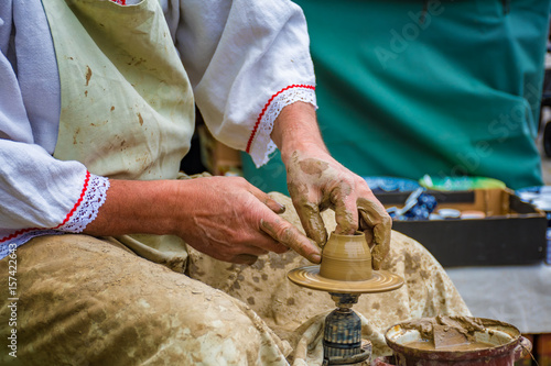 Pottery making on a pottery wheel