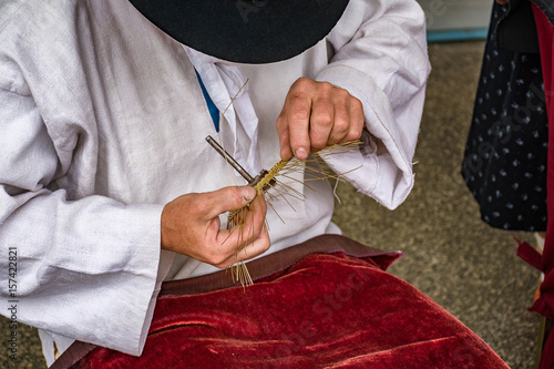 Traditional tinker (Drotar) making a bowl from wire - Folk art