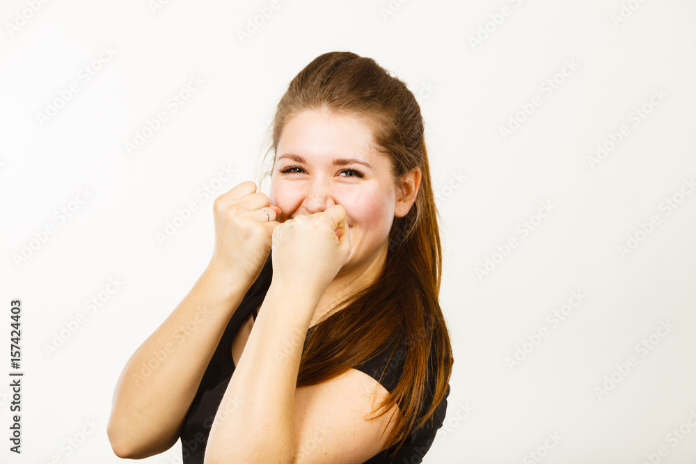 Happy positive woman gesturing success with hands Happy positive woman gesturing success with hands
