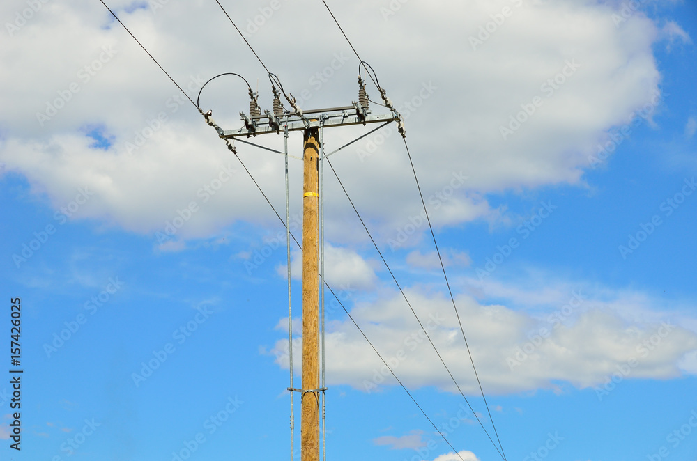 Electrical transmission pylon. Blue sky background. Electrical transmission pylon. Blue sky background.