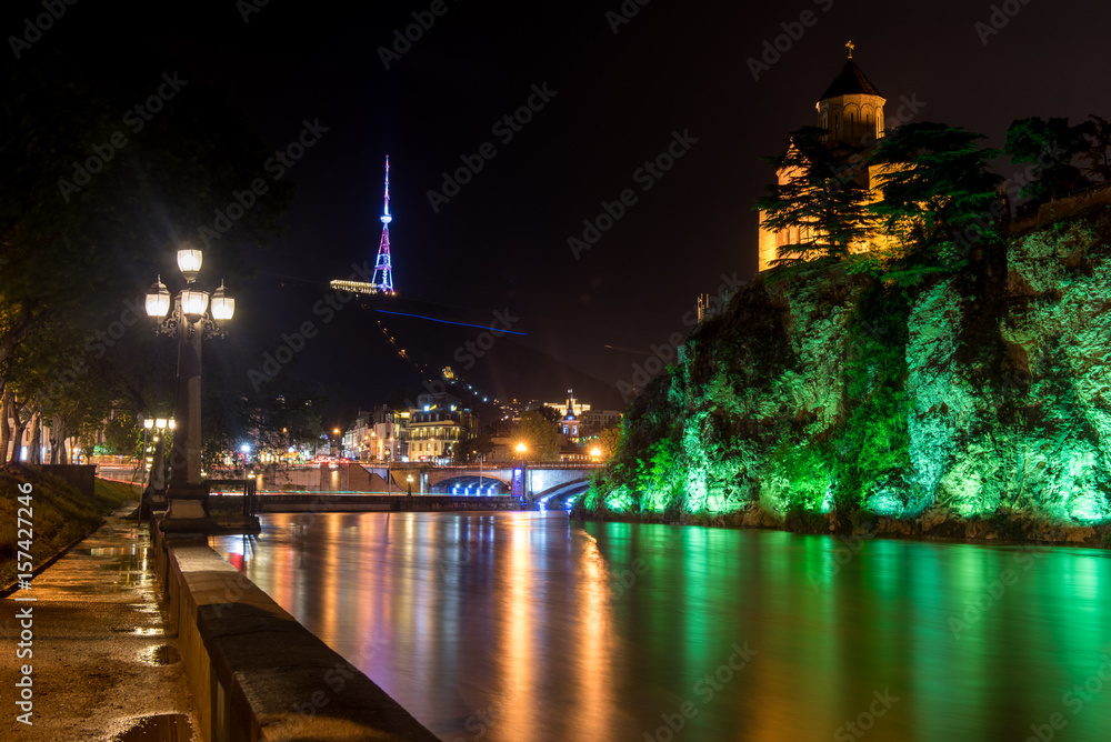 Tbilisi at night with Cathedral and TV-tower, view from river Kura