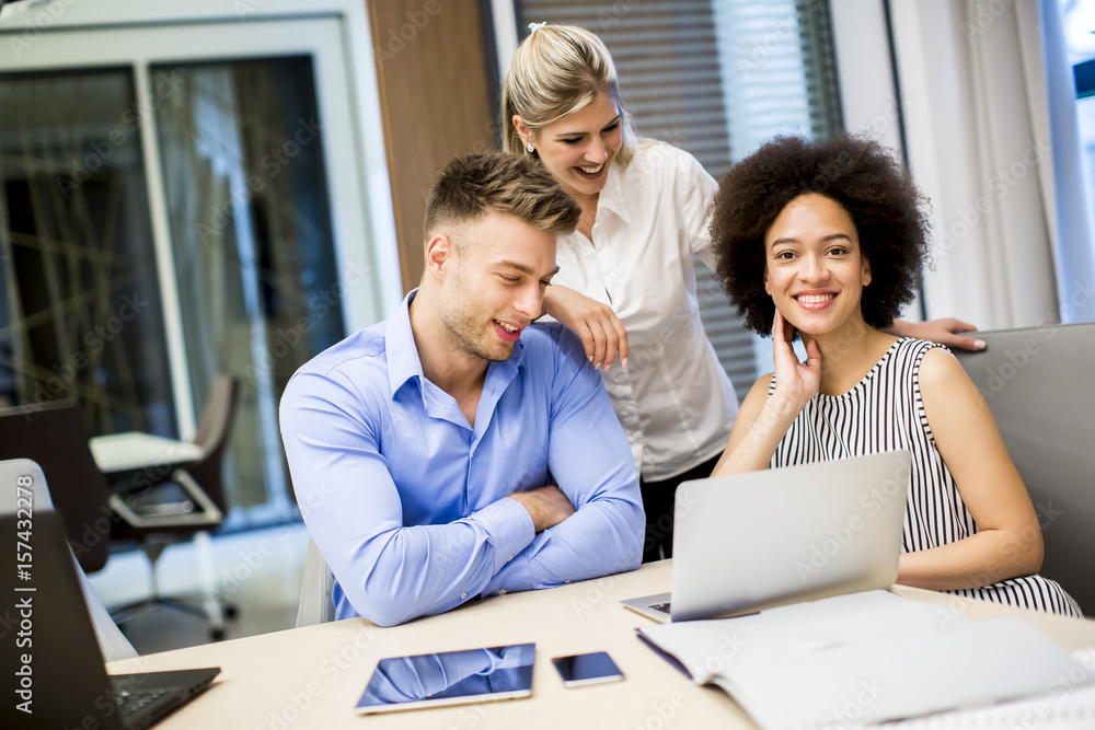 Young business people working in a modern office Young business people working in a modern office