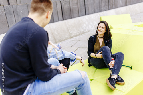 Young people sitting on the...