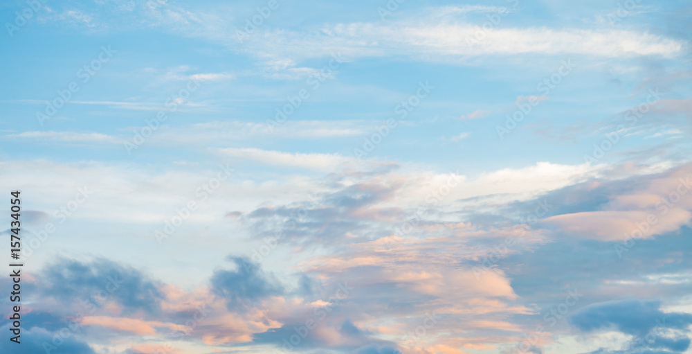 Colorful clouds on blue sky background