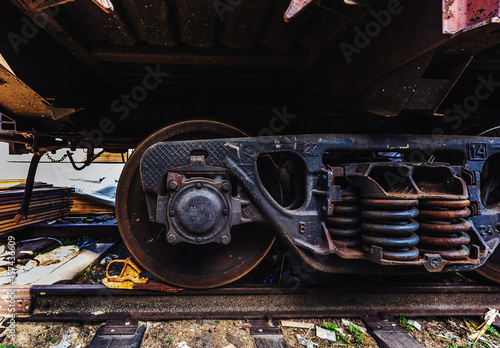 Bilde på lerret Close-up Steel diesel railcar train bogie wheels on the tracks