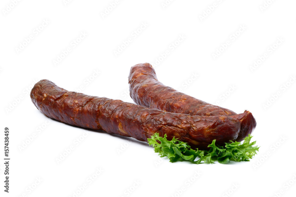 Tasty high quality smoked sausage isolated on white background