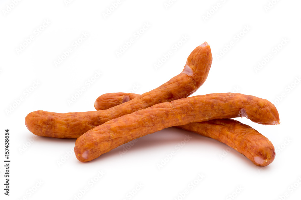 Stack of smoked sausages isolated on a white background. Stack of smoked sausages isolated on a white background.