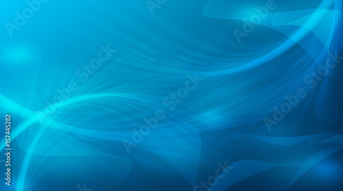 Fantastic waves and light. The rays shine through the darkness. Night. Positive blue background. Depth.