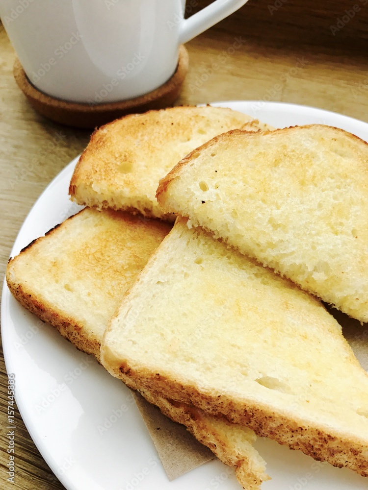 Morning breakfast with coffee and white toast Morning breakfast with coffee and white toast