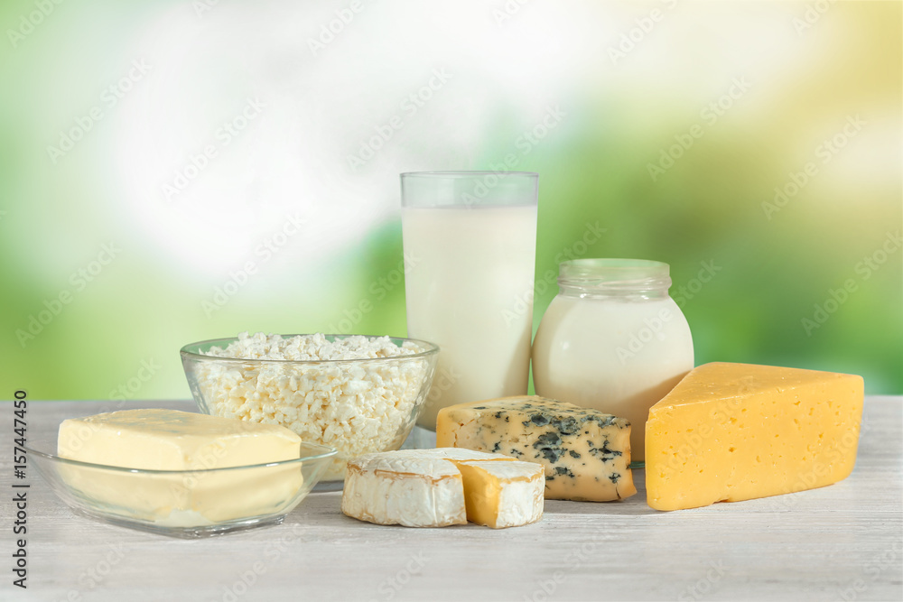 Different dairy products on wooden table Different dairy products on wooden table