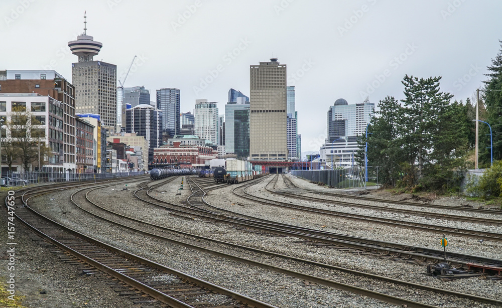 Fototapeta premium Train tracks at Gastown district in Vancouver - VANCOUVER - CANADA - APRIL 12, 2017