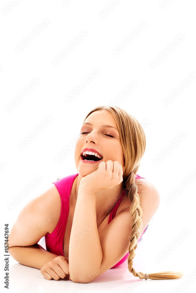 Happy teen girl on the floor