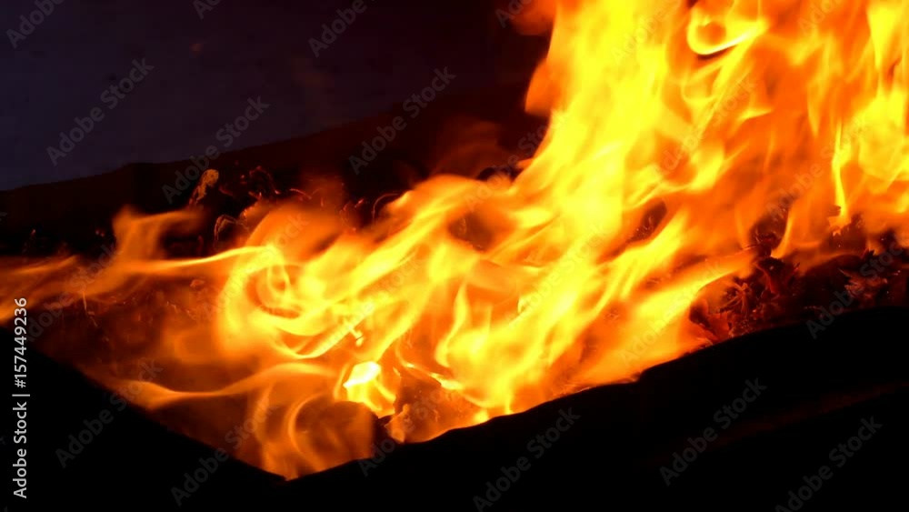 Flame of fire at bonfire, closeup Flame of fire at bonfire, closeup