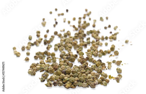  pile dry green peppercorn isolated on white 