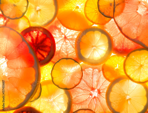 Slices of delicious juicy citrus fruits, closeup