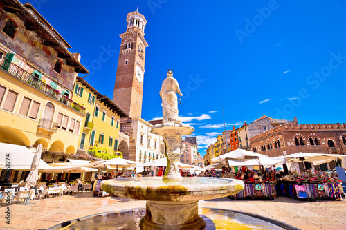 Piazza delle erbe in Verona street and market view