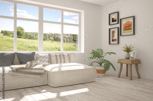 White room with sofa and green landscape in window. Scandinavian interior design. 3D illustration