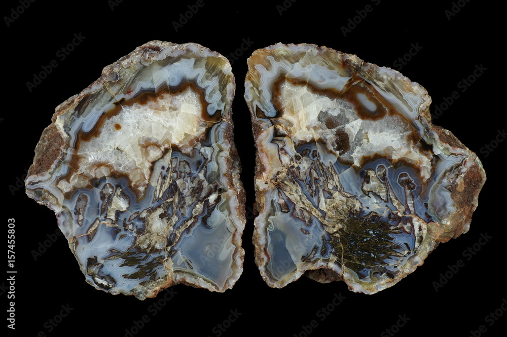 A cross section of the moss agate stone. Moss agate with quartz-calcite geode. Multicolored silica bands colored with metal oxides are visible. Origin: Asni, Atlas Mountains, Morocco.