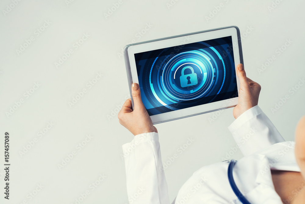 Close of female doctor hands working with tablet pc computer Close of female doctor hands working with tablet pc computer
