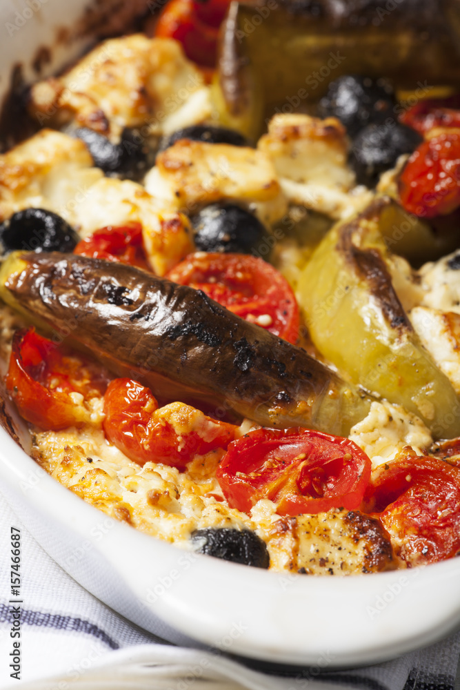 Gegrillter griechischer Feta-Käse mit Tomate Stock-Foto | Adobe Stock
