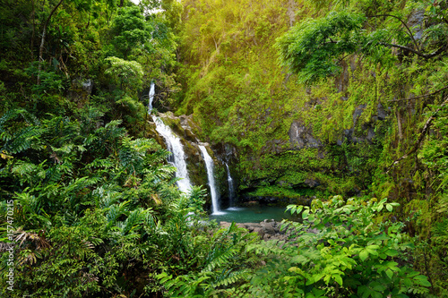 Upper Waikani Falls also known as Three Bears, a trio of large waterfalls amid rocks & lush vegetation with a popular swimming hole, Maui, Hawaii photo