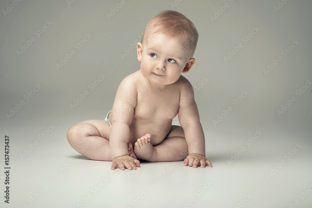 Adorable little baby boy posing. Adorable little baby boy posing.