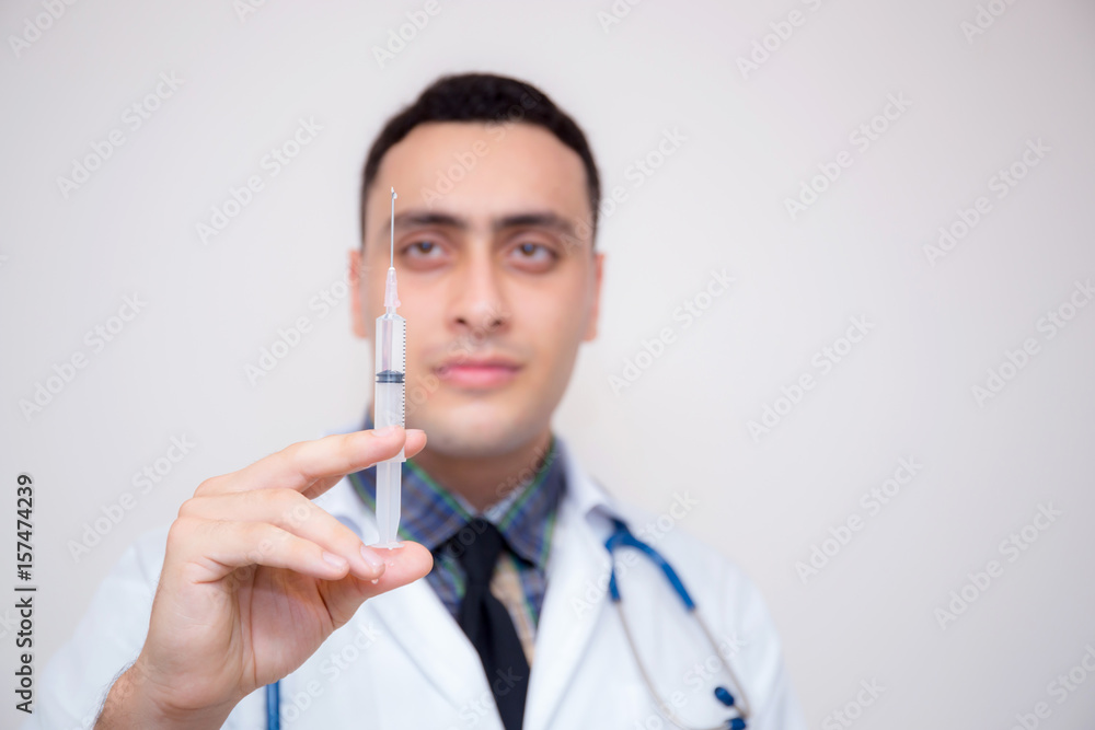 Syringe - medical injection in hand -Medicine plastic with holding doctor vaccination equipment - Health care in hospital. Syringe - medical injection in hand -Medicine plastic with holding doctor vaccination equipment - Health care in hospital.