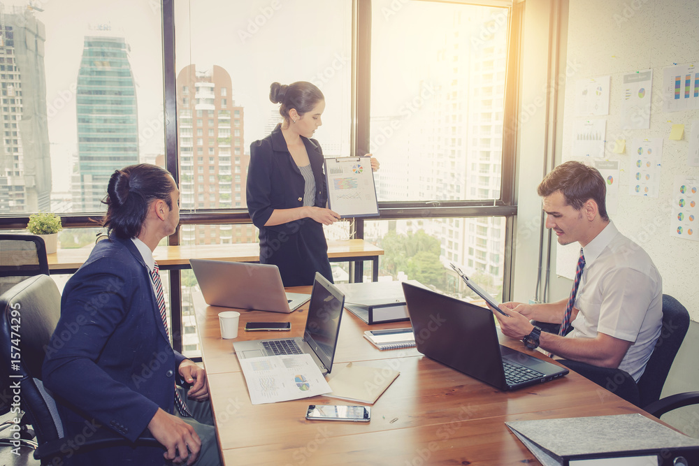 businesswoman presentation to a group in meeting. businesswoman presentation to a group in meeting.