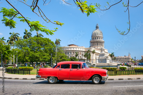 Photography Classic american car next to the Capitol building in Old Havana