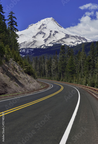 Snow covered Mount Hood, a volcano in the Cascade Mountains in Oregon popular for hiking, climbing, snowboarding and skiing, despite the risks of avalanche, crevasses and volatile weather on the peak.