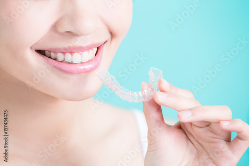 woman take invisible braces